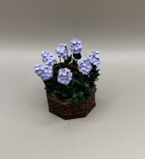 Purple Flowers in Wooden Basket