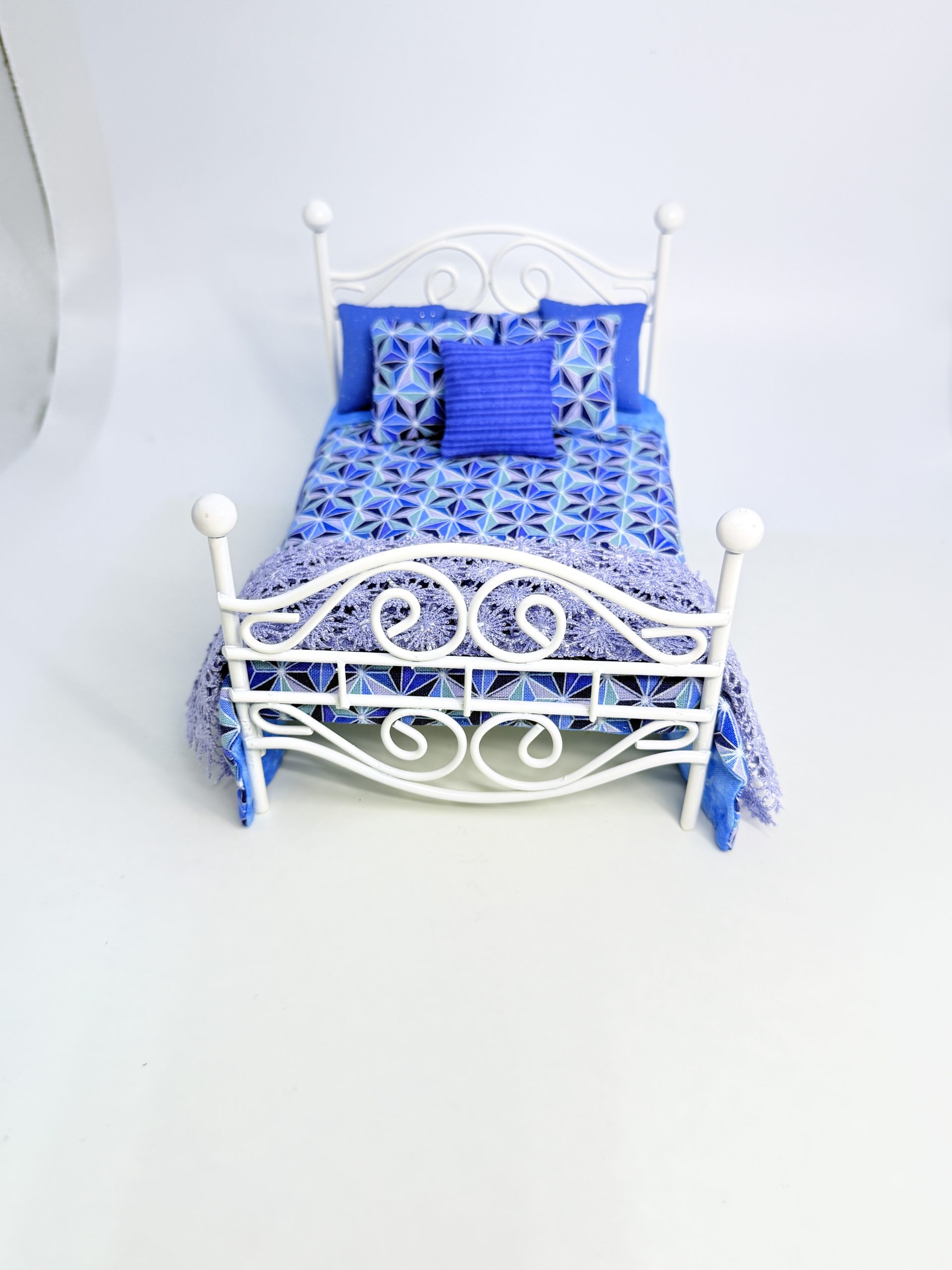 White Metal Bed with Geometric Cover - Image 2